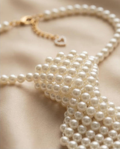 Collana con fiocco e perle
