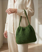 VT BAGS – MODELLO “FOREST EMERALD BUCKET BAG”