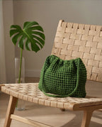 VT BAGS – MODELLO “FOREST EMERALD BUCKET BAG”